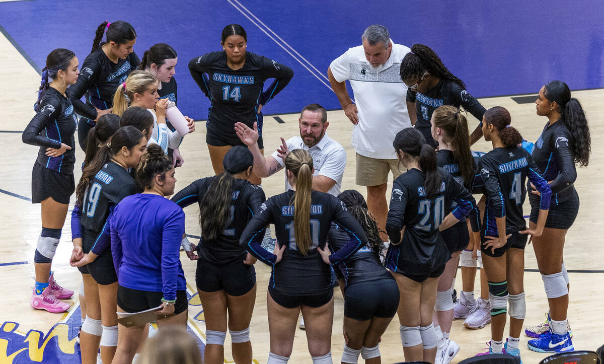 Silverado head coach Kevin Schwallie keeps his players focused on a timeout against Sierra Vist ...