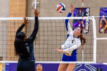 Sierra Vista's Averie Gidge (4)spikes the ball as Silverado's Kalia Roberts (15) elev ...