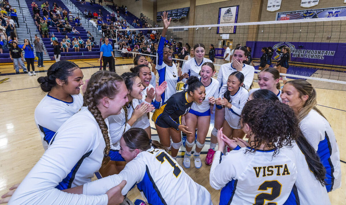 Sierra Vista players celebrate their match victory over Silverado and winning the 4A girls voll ...