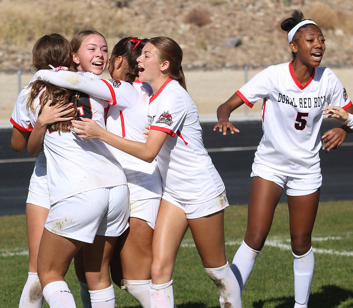 Doral Academy Red Rock girls soccer team celebrates after defeating Galena to win the NIAA 4A s ...