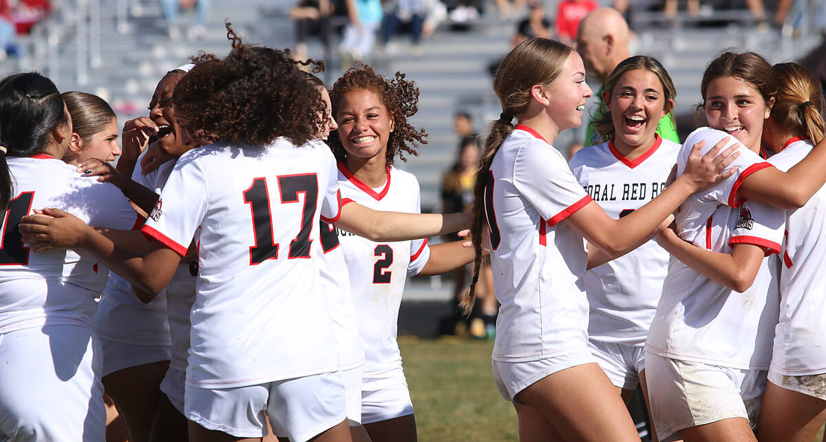Doral Academy Red Rock girls soccer team celebrates after defeating Galena to win the NIAA 4A s ...