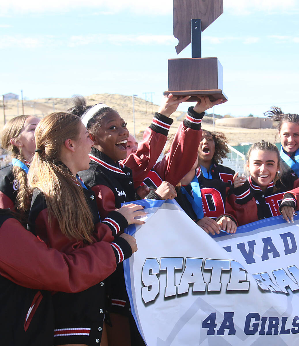 Doral Academy Red Rock girls soccer team celebrates after defeating Galena to win the NIAA 4A s ...