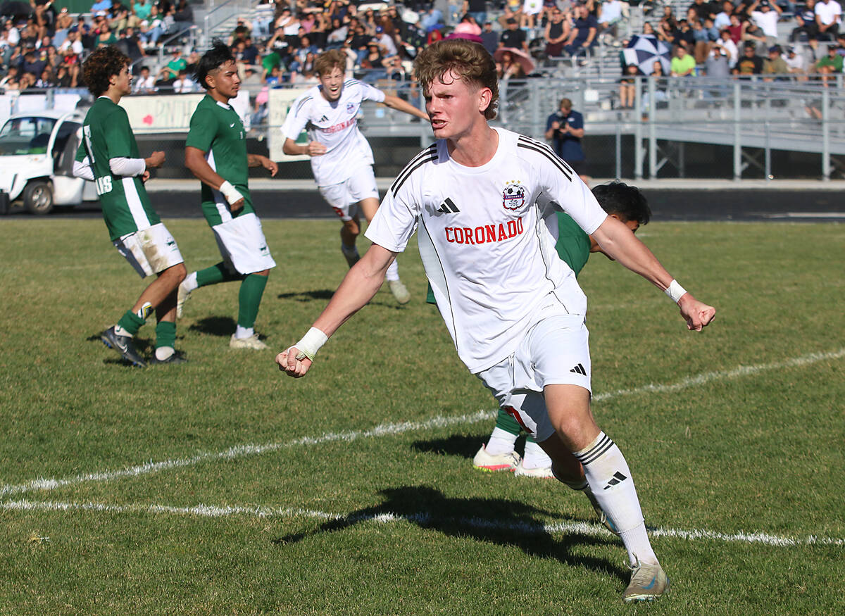 Coronado’s Gavin Biddinger celebrates after scoring a goal against Hug during the NIAA 5A s ...