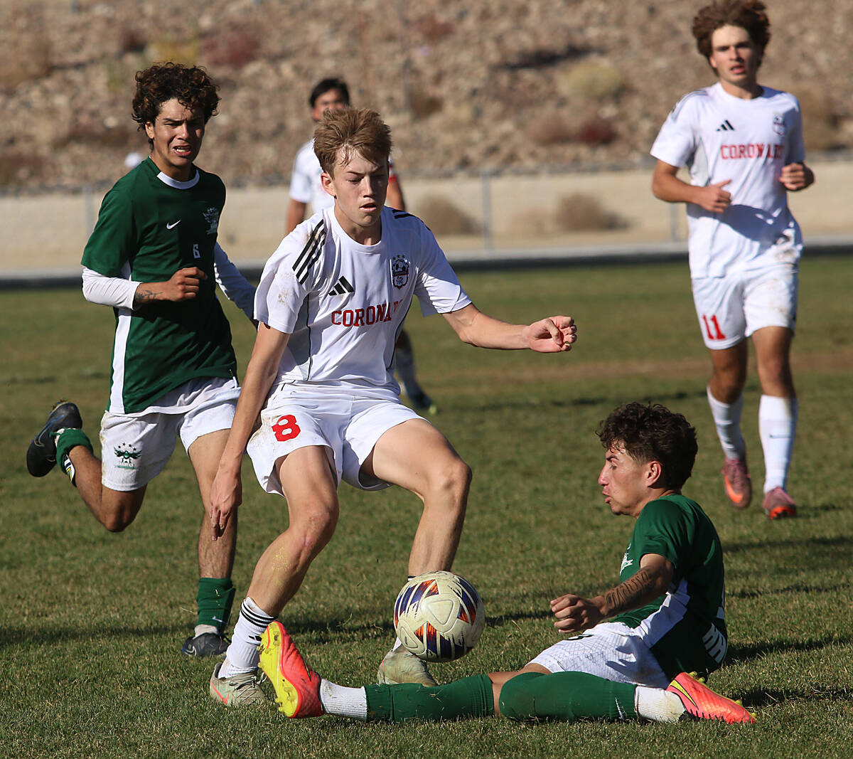 Coronado’s Cy Adams avoids a tackle during the NIAA 5A state championship soccer game at Hug ...