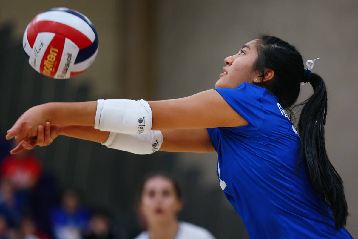 Bishop Gorman libero Chloe Lopez (12) passes during the 5A girls volleyball state championship ...