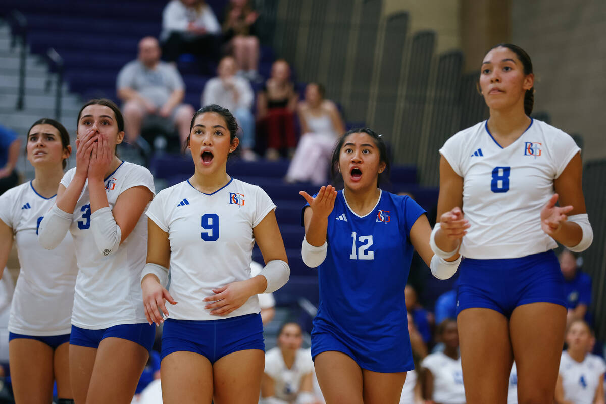 Bishop Gorman players react to a ball called in on their side during the 5A girls volleyball st ...