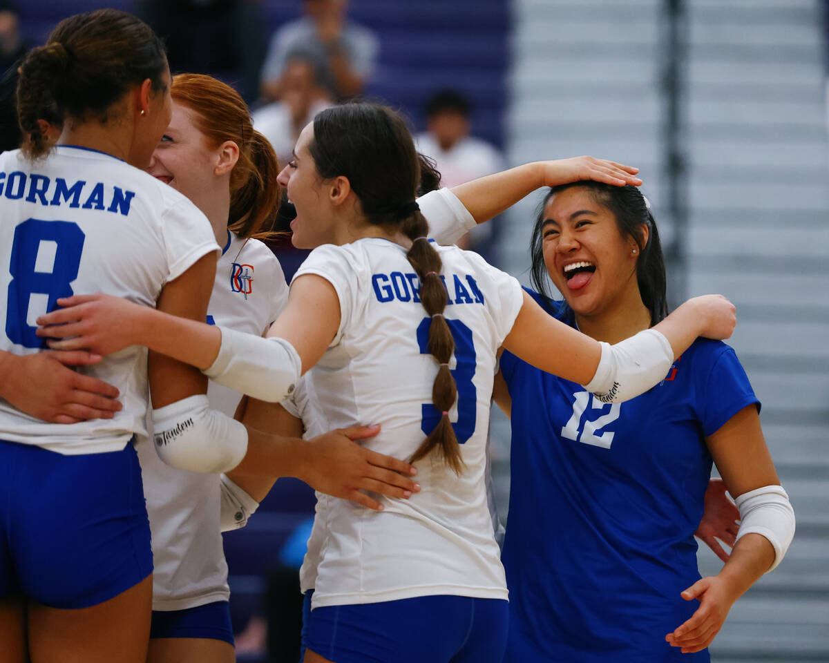 Bishop Gorman libero Chloe Lopez (12) celebrates a successful hit made by a teammate during the ...