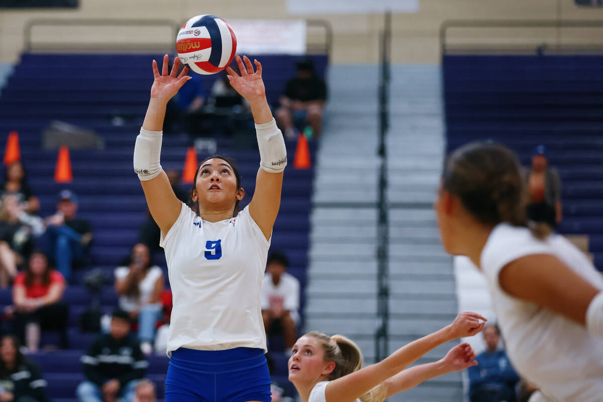 Bishop Gorman setter Trinity Thompson (9) sets to the outside during the 5A girls volleyball st ...