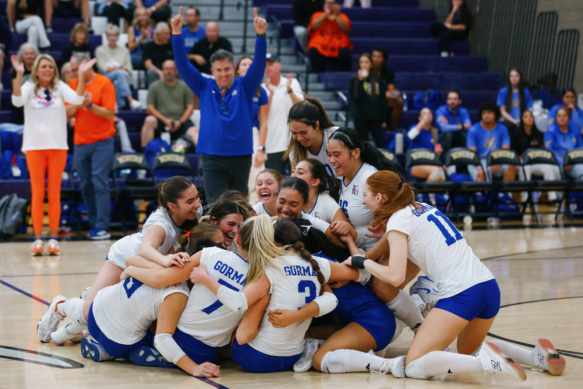 The Bishop Gorman team celebrates the Gaels’ win over Coronado in the 5A girls volleybal ...