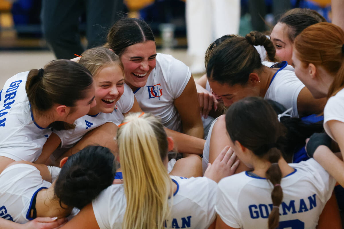 The Bishop Gorman team celebrates the Gaels’ win over Coronado in the 5A girls volleybal ...