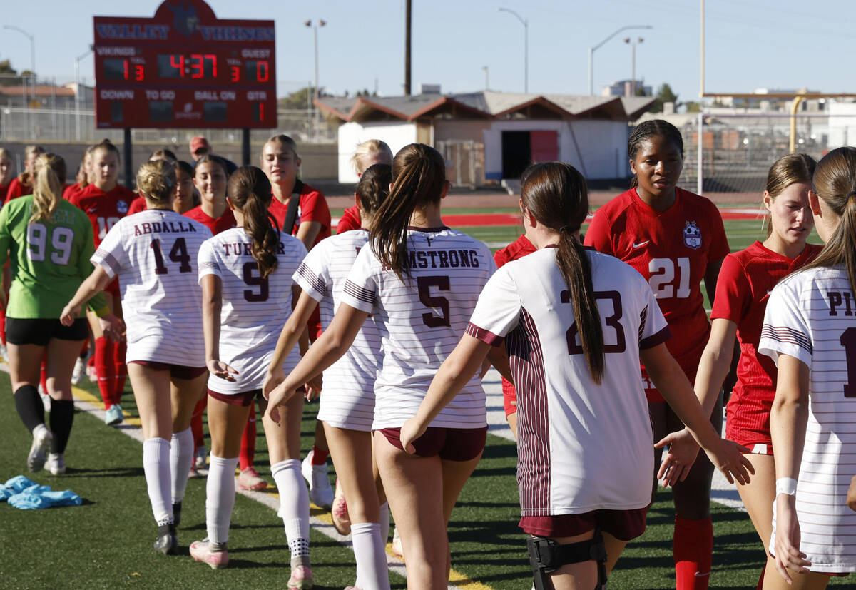Faith Lutheran and Coronado girls soccer team congratulate each other after a Class 5A girls s ...