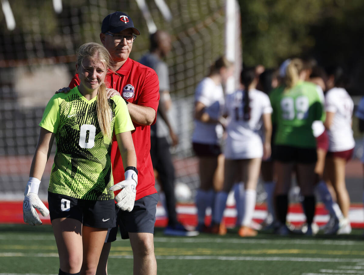 Faith Luteran's girls soccer players, right, celebrate as Coronado's goalkeeper Lilia ...