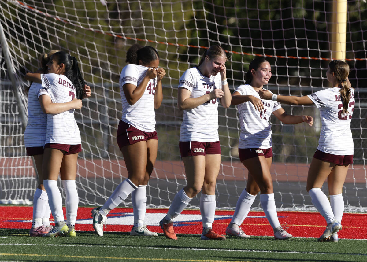 Faith Lutheran's girls soccer players get emotional as they celebrate their win against Co ...