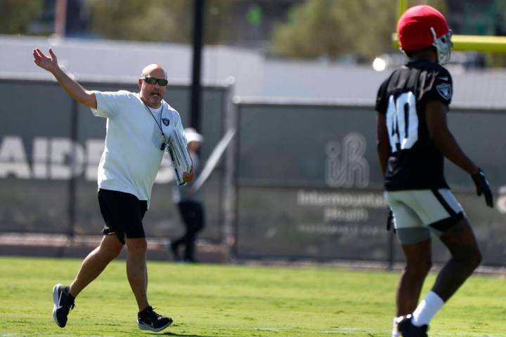 Raiders special teams coordinator Tom McMahon directs his players during practice at the Interm ...