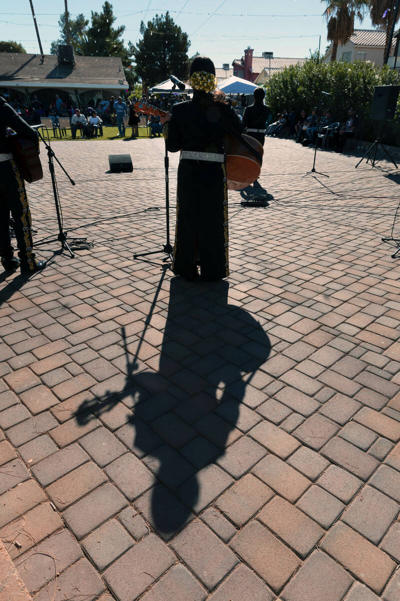 Musicians with the student mariachi group from Clark High School entertain the crowd during a c ...