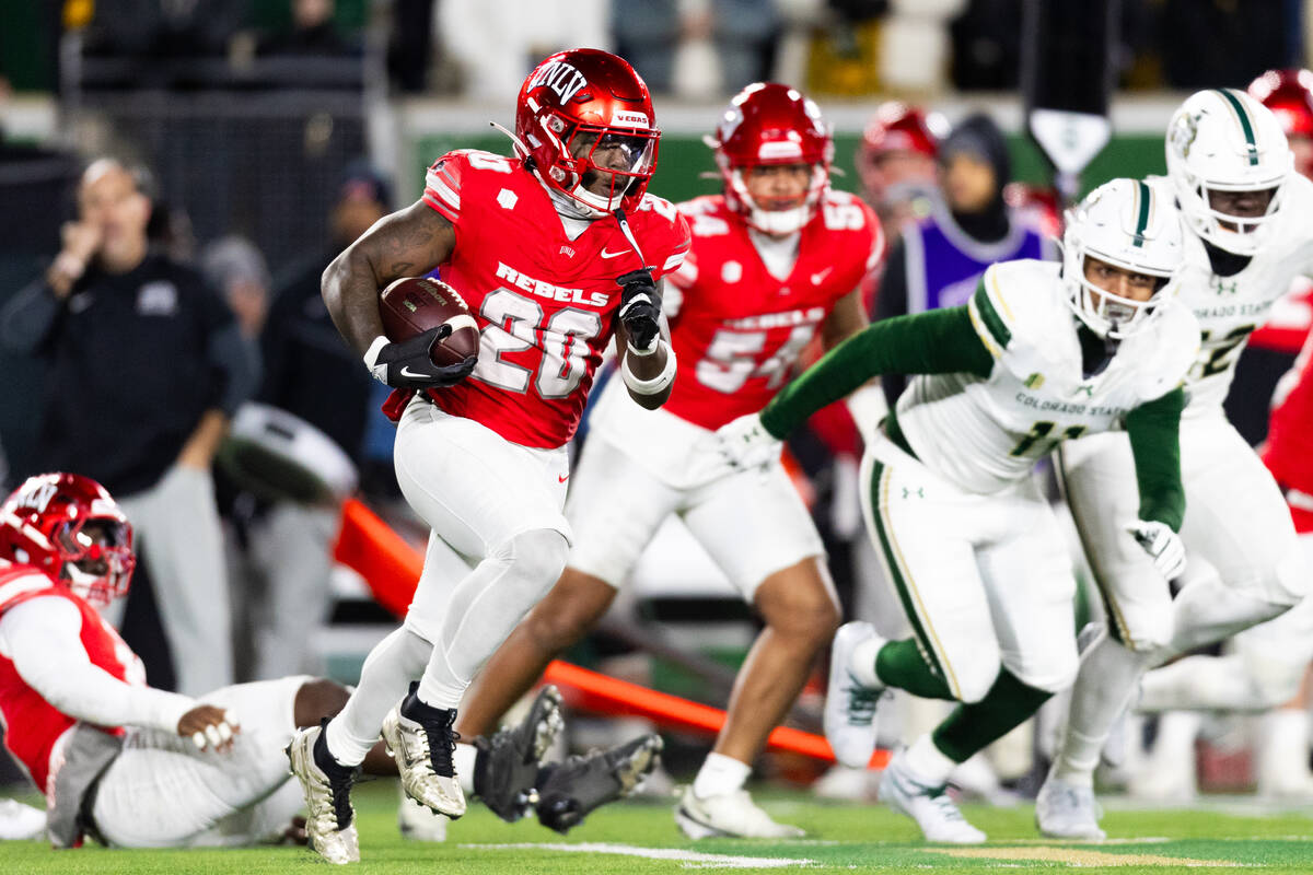UNLV running back Jaylon Glover (20) returns a kick off against the Colorado State Rams during ...