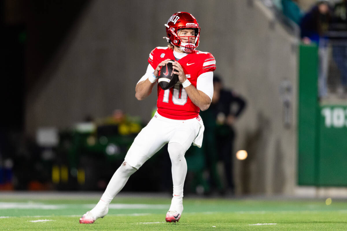 UNLV quarterback Anthony Colandrea (10) looks to pass against the Colorado State Rams during th ...