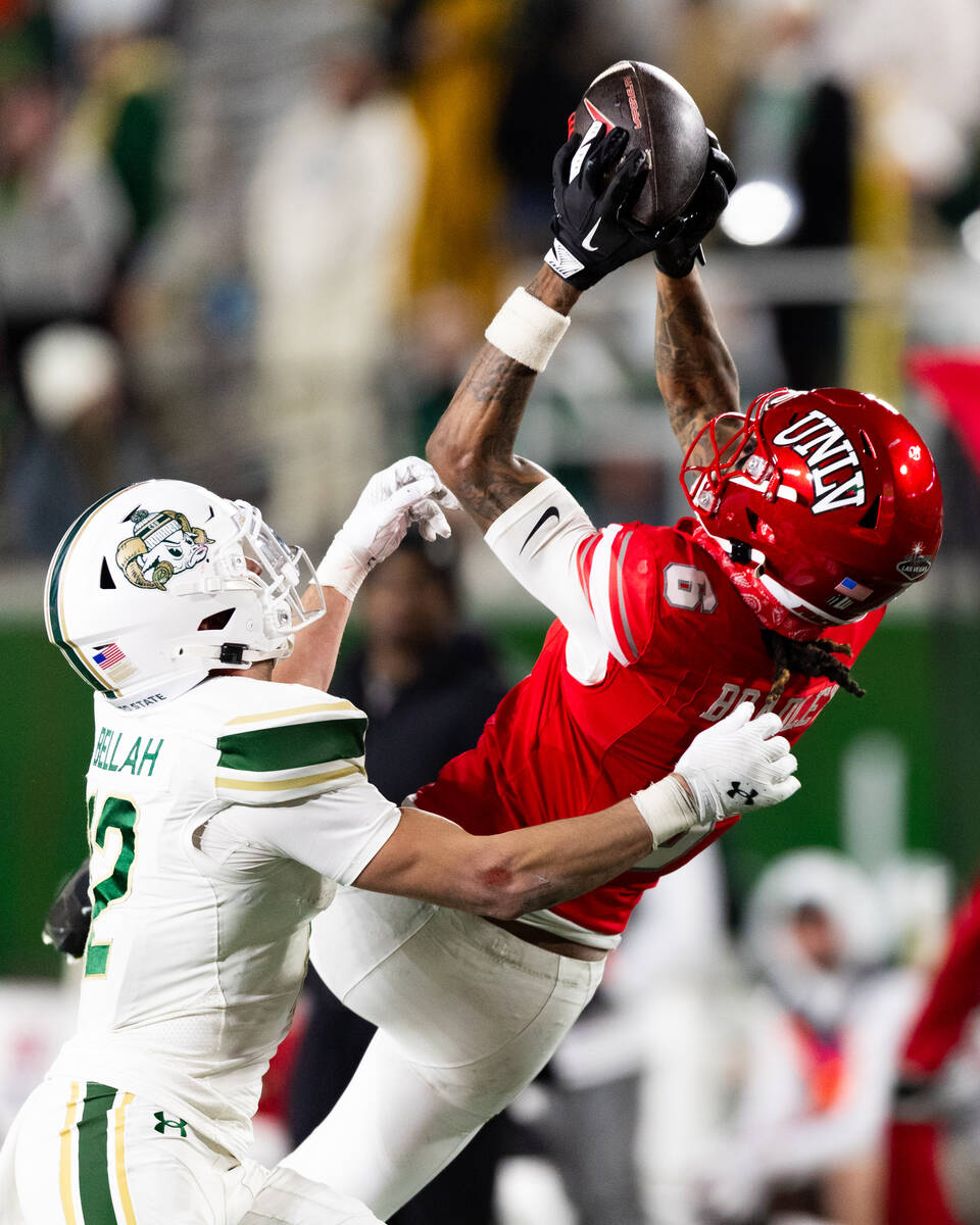 UNLV wide receiver Jaden Bradley (6) catches the ball over the head of Colorado State Rams defe ...