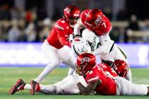 UNLV defense tackles Colorado State Rams wide receiver Lavon Brown (8) during the second half o ...
