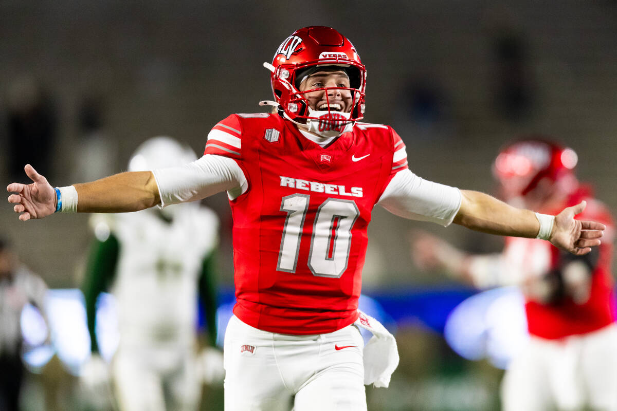 UNLV quarterback Anthony Colandrea (10) celebrates after throwing a touchdown pass against the ...