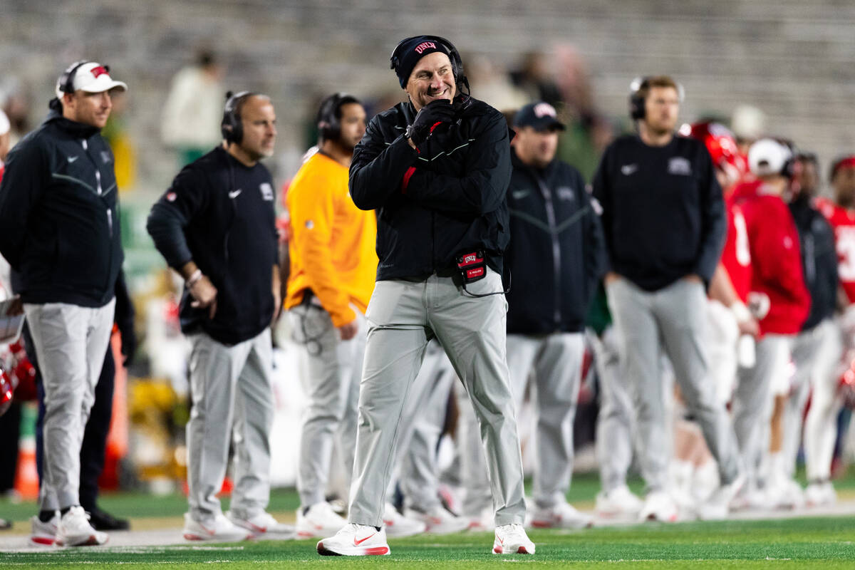 UNLV Head Coach Dan Mullen winces during the second half of their NCAA football game against th ...