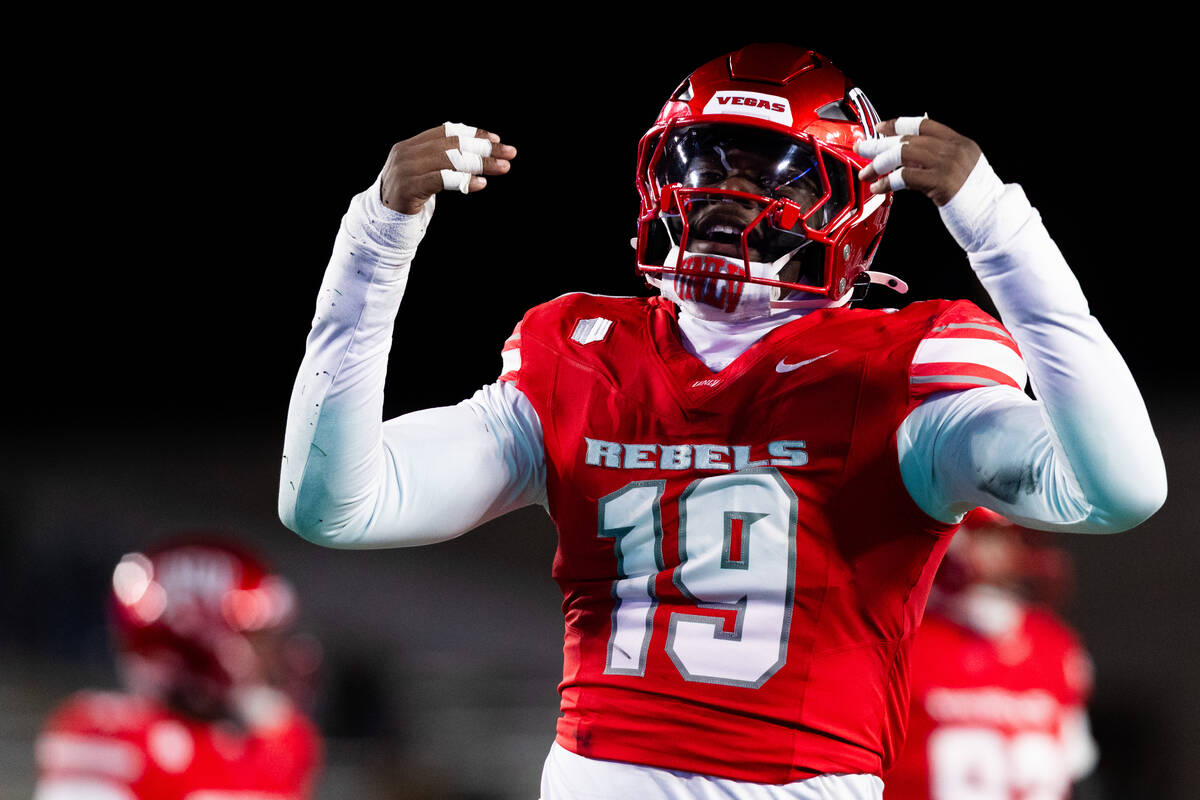 UNLV Linebacker Donovan Spellman (19) taunts crowd after defensive stop against the Colorado St ...