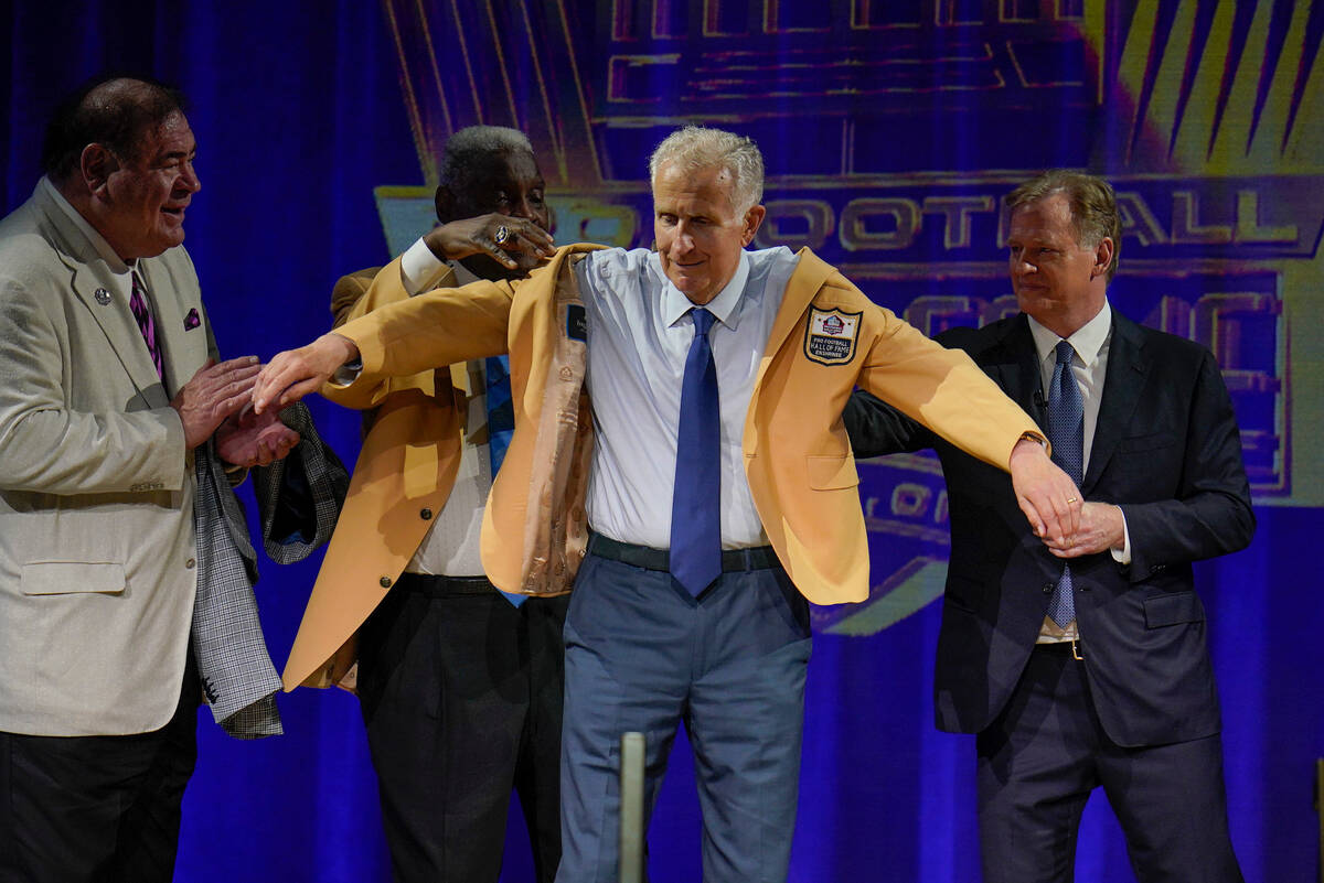 FILE - Paul Tagliabue, a member of the Pro Football Hall of Fame Centennial Class, receives his ...