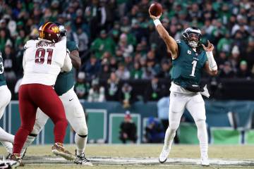 Philadelphia Eagles quarterback Jalen Hurts (1) throws the ball during the NFC Championship NFL ...