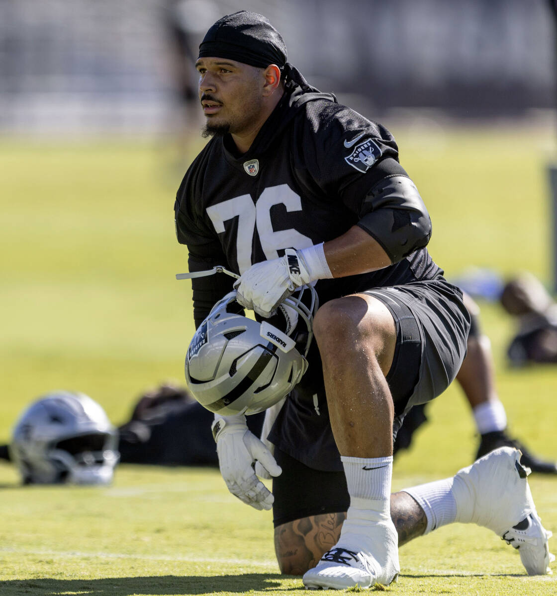 Raiders guard Caleb Rogers (76) kneels during the team’s practice at the Intermountain H ...
