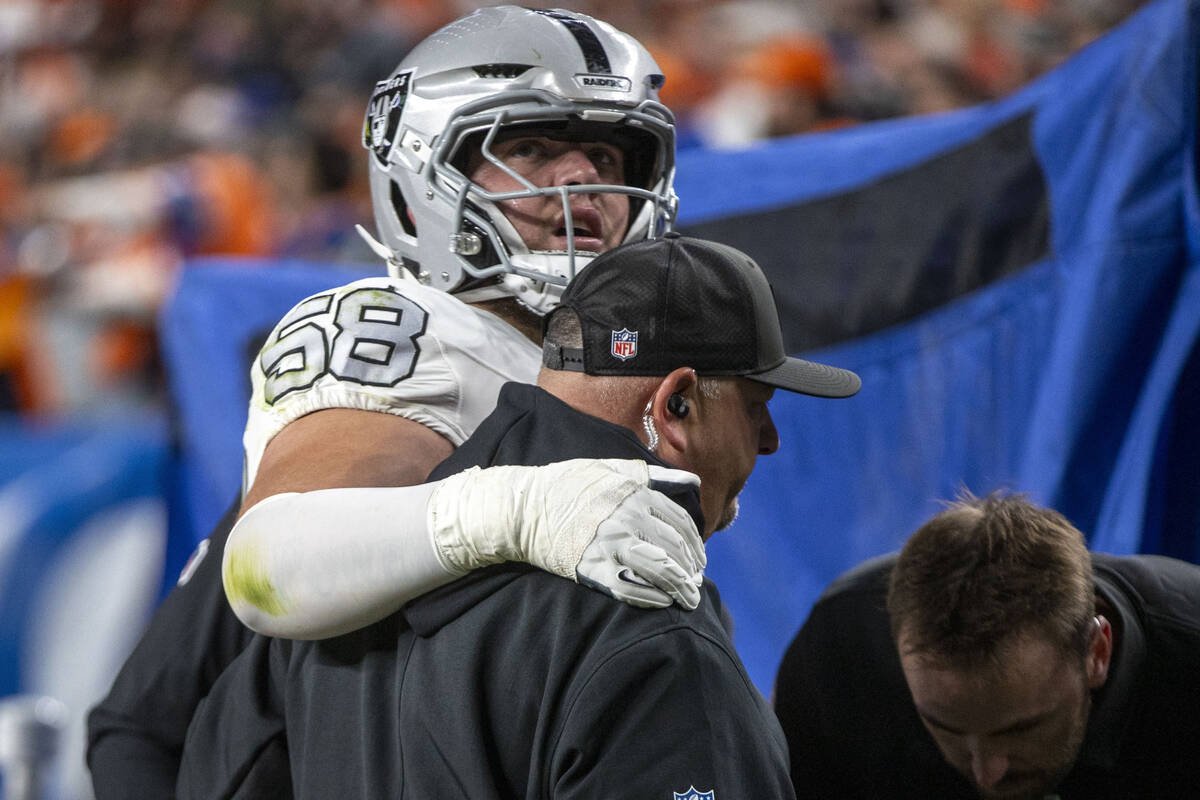 Raiders guard Jackson Powers-Johnson (58) leaves the field after being injured during the first ...