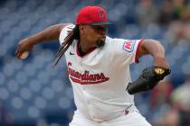 Cleveland Guardians' Luis Ortiz pitches in the first inning of a baseball game against the Min ...