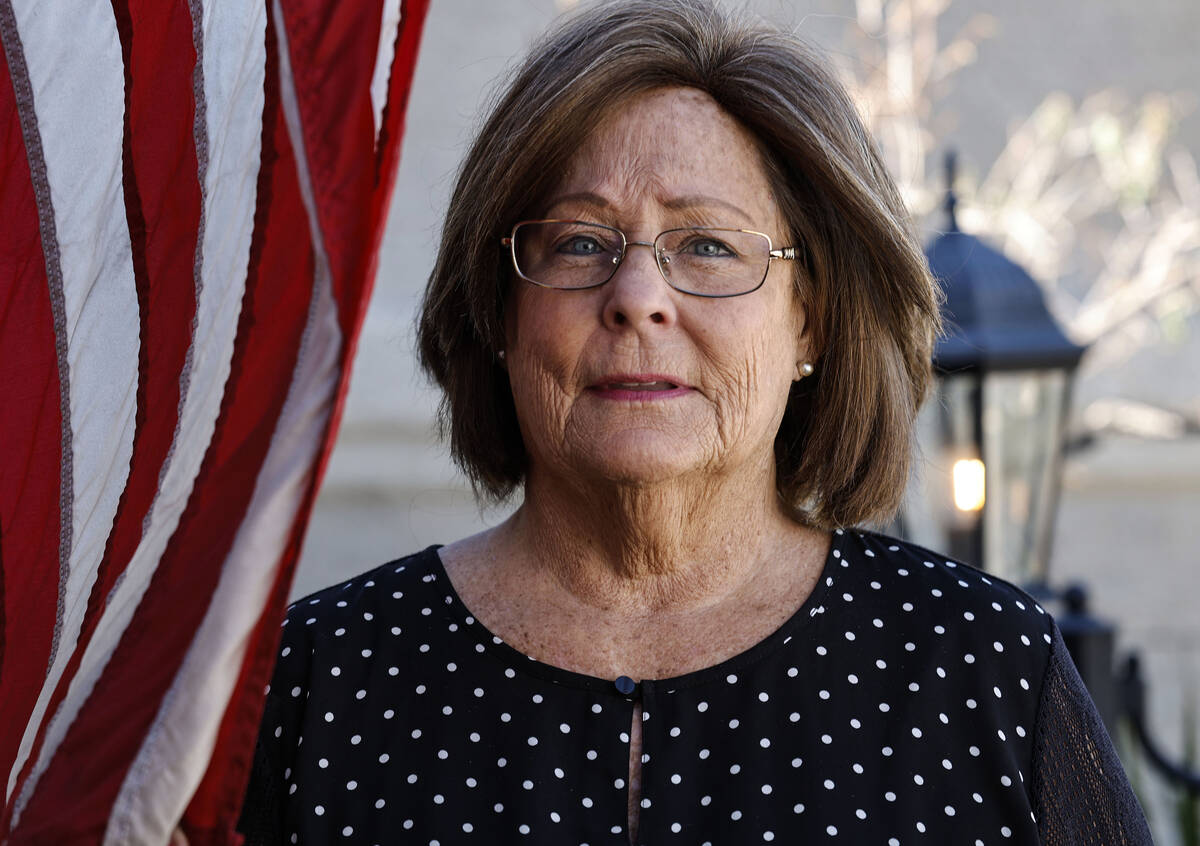 Janis Millholland, the widow of U.S. Army veteran Paul Millholland, poses for a photograph Frid ...