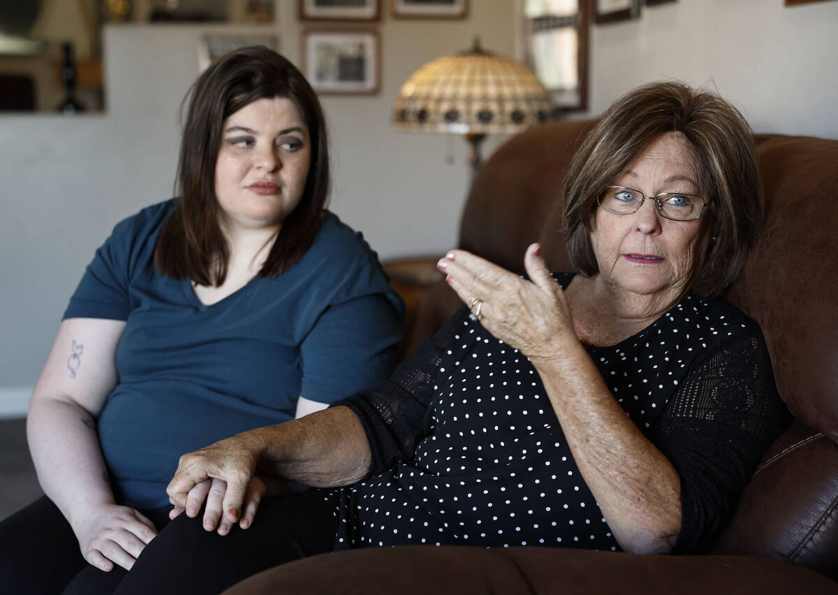 Janis Millholland, right, the widow of U.S. Army veteran Paul Millholland, with daughter Savann ...