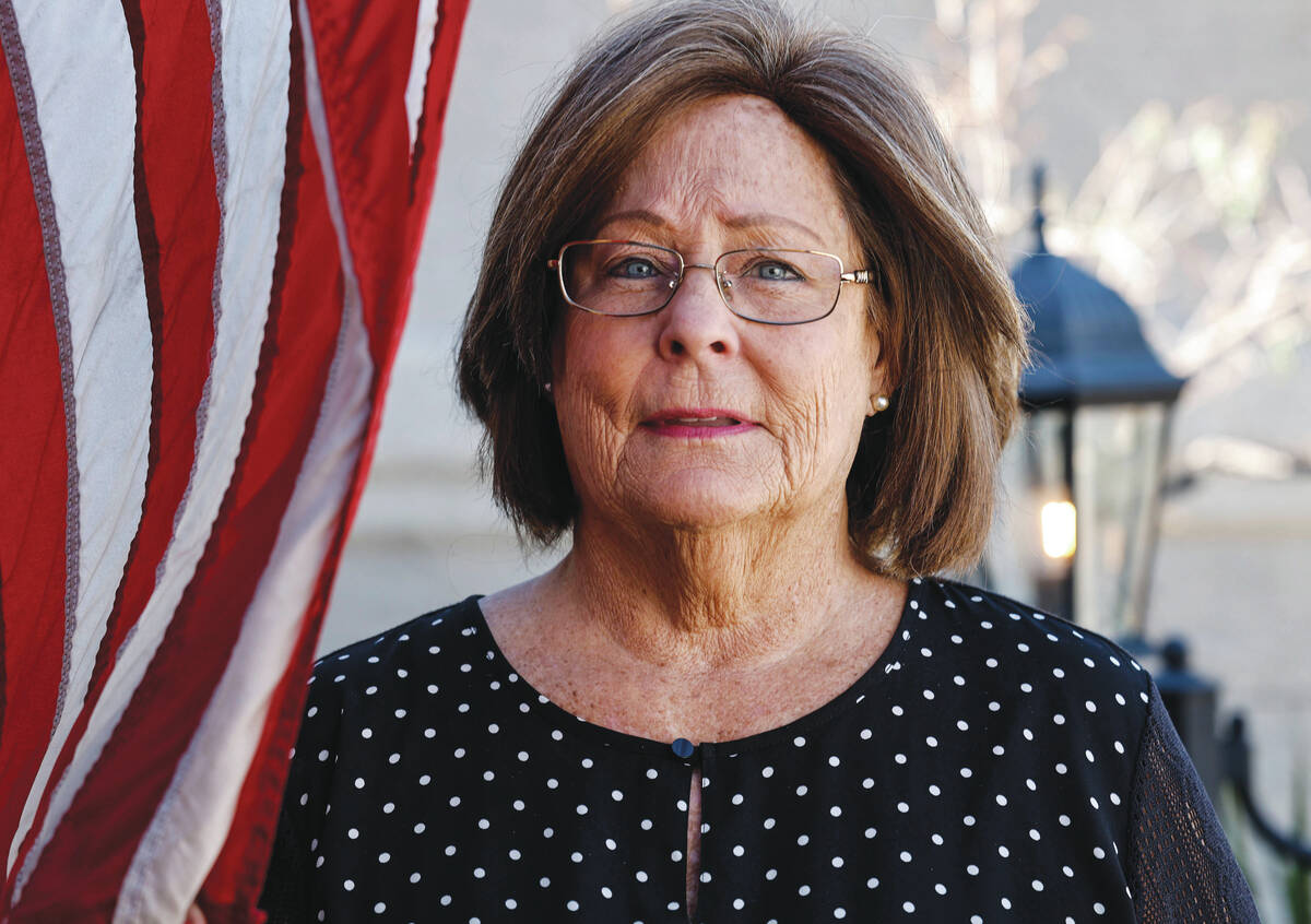 Janis Millholland, the widow of U.S. Army veteran Paul Millholland, poses for a photograph Frid ...