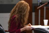 Devyn Michaels looks down during her trial in the killing and decapitation of her on-and-off bo ...