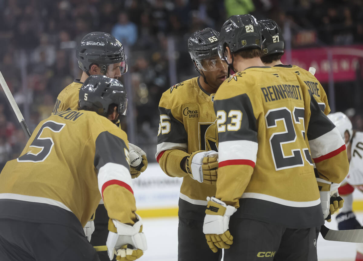 Golden Knights right wing Keegan Kolesar (55) talks with teammates during the second period of ...