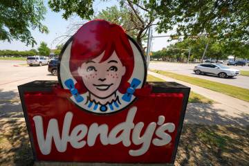 A sign is seen at a Wendy's restaurant Tuesday, Aug. 5, 2025, in Garland, Texas. (AP Photo/Juli ...