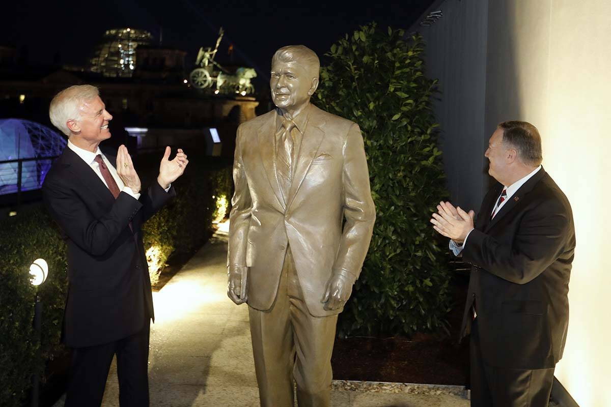 A statue of former President Ronald Reagan on the top of United States embassy in Berlin, Germa ...