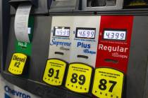 Gas prices on display at a Chevron pump on Tuesday, Nov. 11, 2025, in Las Vegas. (Chase Stevens ...