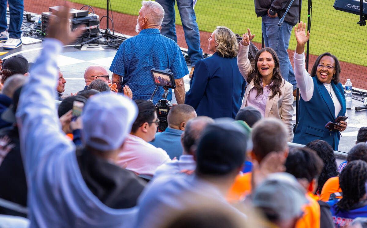 Assemblymembers Daniele Monroe-Moreno and Sandra Jauregui wave to the crowd on hand to talk ab ...