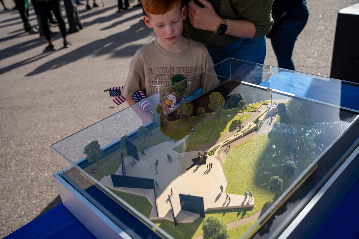 Connor Murphy, 6, checks out a model of the Nevada State Veterans Memorial at the Thunderbird F ...