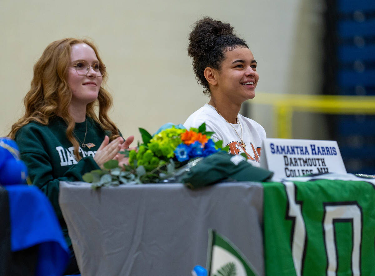 A crowd of family and friends applauds for Aaliah Spaight during Bishop Gorman High School&#x20 ...