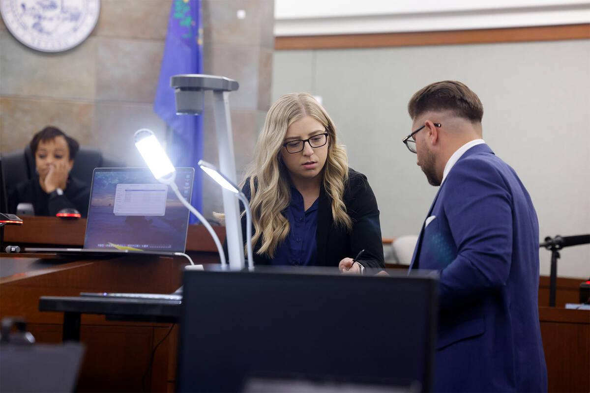 Deputy District Attorney Brittni Griffith, center, and attorney Michael Horvath, representing D ...