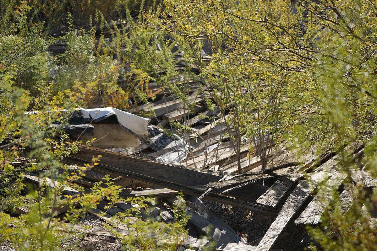 Weathered wood and busted-up building materials are remnants of Big Spring Springhouse, which o ...