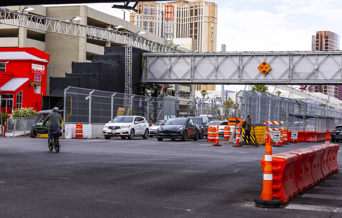 Traffic moves along at the intersection of Flamingo Road and Harmon Avenue as the final prep i ...