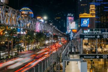 Traffic moves past temporary grandstands in front of the Bellagio along Las Vegas Boulevard on ...