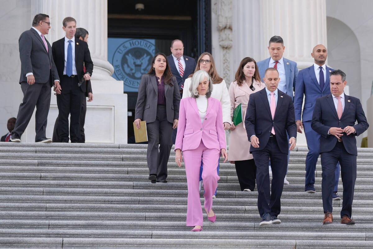 House Minority Leader Hakeem Jeffries, D-N.Y., center, Rep. Katherine Clark, D-Mass., left, Hou ...