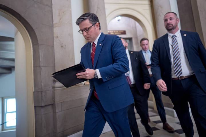 Speaker of the House Mike Johnson, R-La., heads from his office to the chamber for the final vo ...
