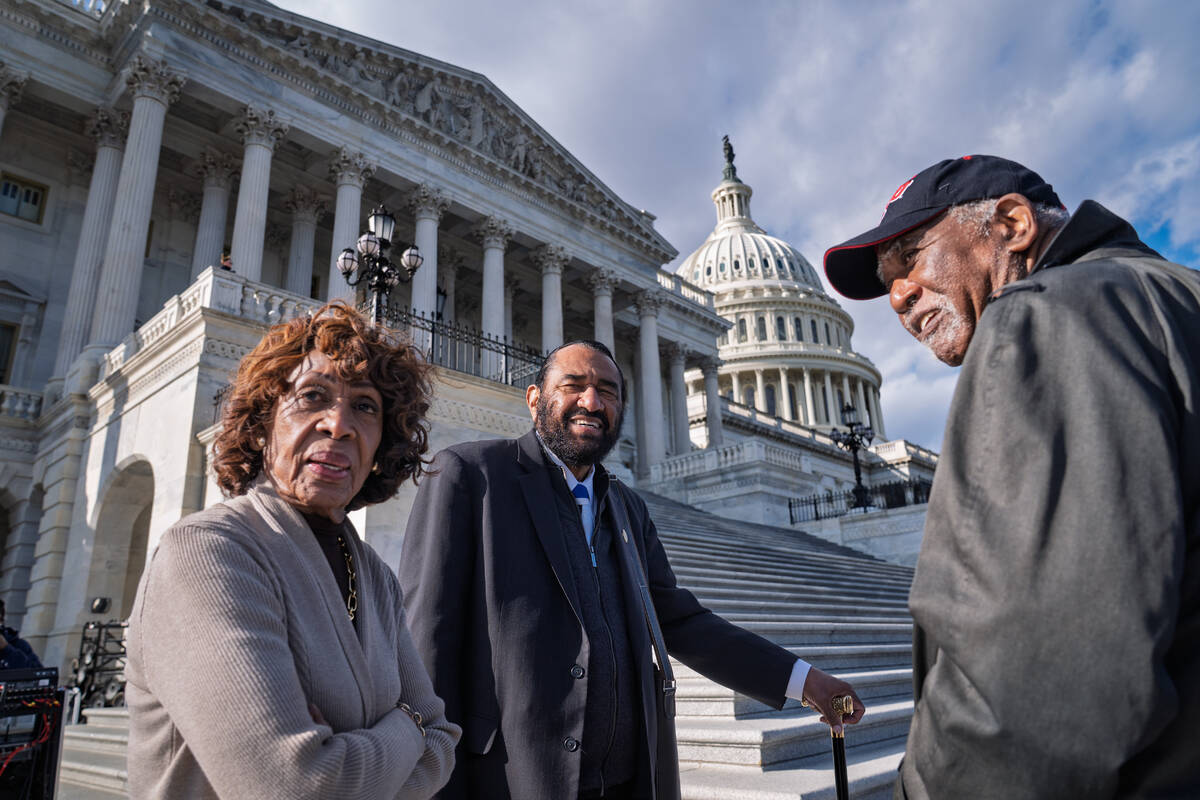 From left, Rep. Maxine Waters, D-Calif., Rep. Al Green, D-Texas, and Rep. Danny Davis, D-Ill., ...