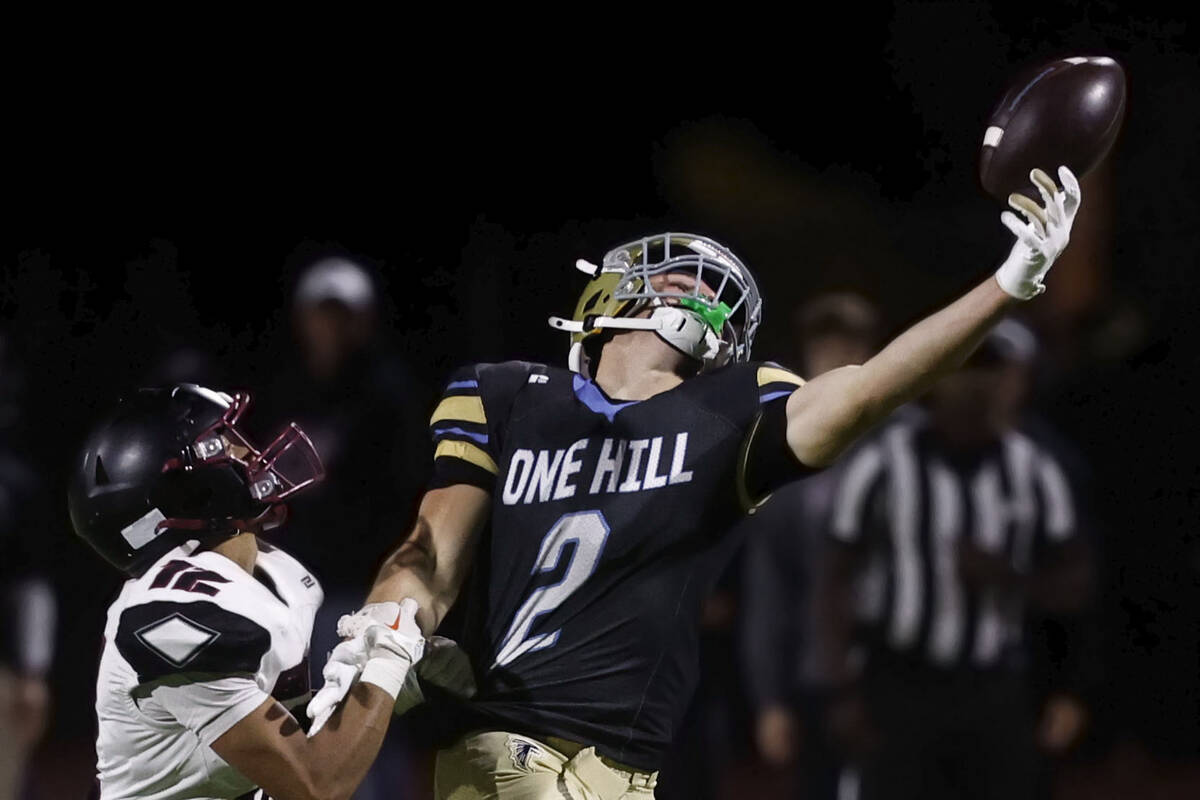 Foothill wide receiver Nixon Gasperosky (2) extends to try and catch a pass over Desert Oasis d ...